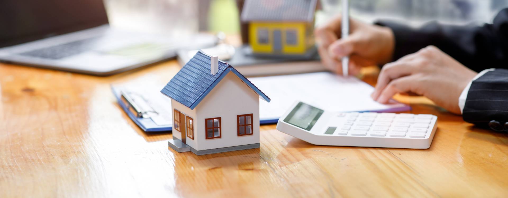 Parents and adult child meeting a Perth mortgage broker to discuss parents guarantor first home buyer Perth loan structure and independent legal advice requirements