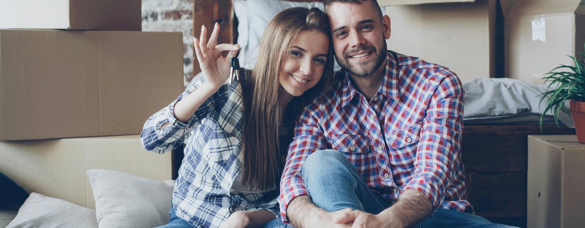 Perth first home buyer couple reviewing Perth home loan affordability 2026 repayment calculations with broker after RBA raised cash rate to 4.10% in March 2026